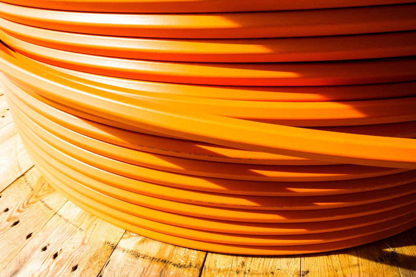 Orange Fiber optic cable on spool